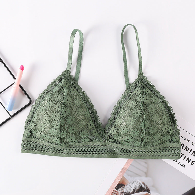 Olive Green Shelliy Bralette Laid Flat Beside Pen And Magazine — Flat-lay